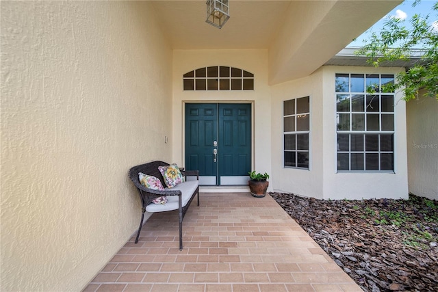 603 Loma Del Sol Dr, Davenport, FL 33896 - entrance to property featuring stucco siding