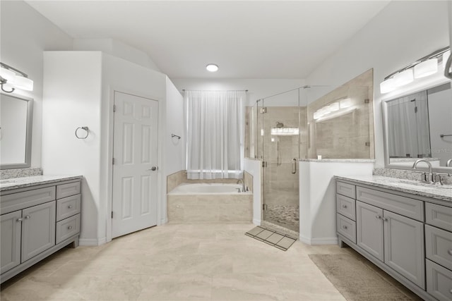 603 Loma Del Sol Dr, Davenport, FL 33896 - bathroom with a garden tub, a shower stall, and two vanities