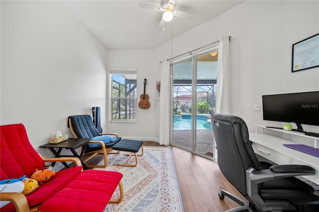 603 Loma Del Sol Dr, Davenport, FL 33896 - office space with a ceiling fan and wood finished floors
