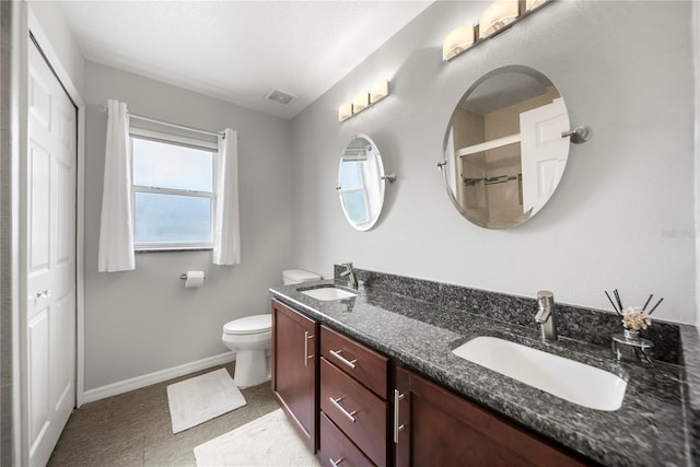 603 Loma Del Sol Dr, Davenport, FL 33896 - full bathroom featuring double vanity and a shower
