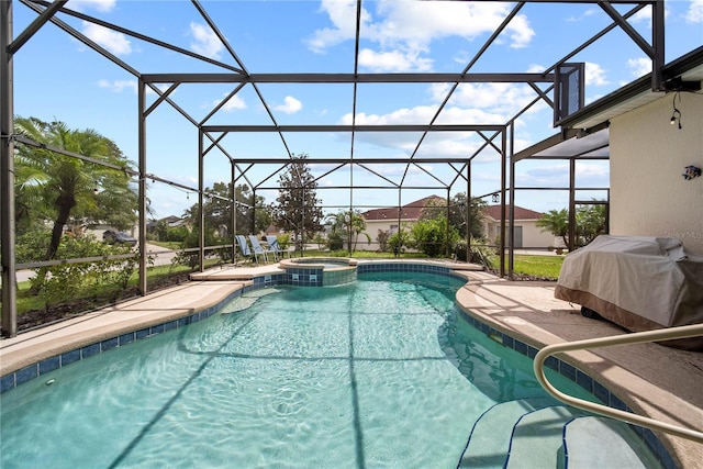 603 Loma Del Sol Dr, Davenport, FL 33896 - view of swimming pool with a patio, a pool with connected hot tub, a grill, and glass enclosure