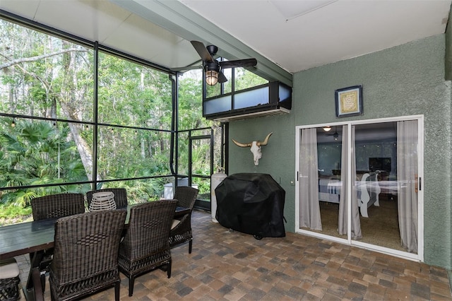 5619 Essex Ct, Palm Harbor, FL 34685 - sunroom / solarium featuring a ceiling fan and outdoor dining space