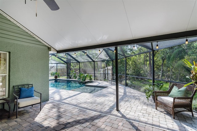 5619 Essex Ct, Palm Harbor, FL 34685 - sunroom with ceiling fan and a swimming pool