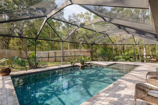 5619 Essex Ct, Palm Harbor, FL 34685 - view of pool with a fenced backyard, glass enclosure, and a patio area