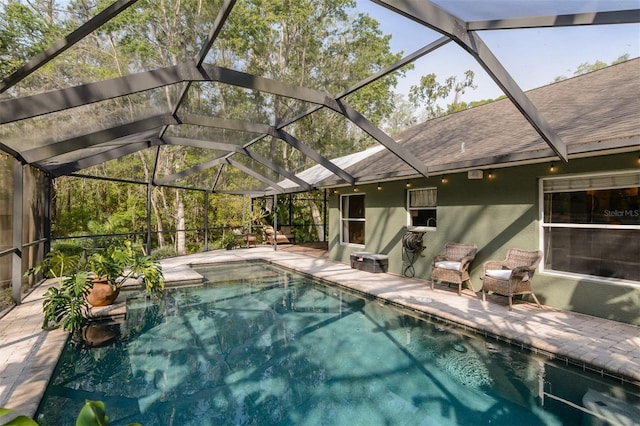 5619 Essex Ct, Palm Harbor, FL 34685 - outdoor pool with a patio area and a lanai