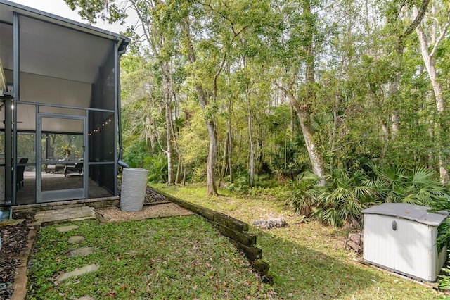 5619 Essex Ct, Palm Harbor, FL 34685 - view of yard featuring a sunroom