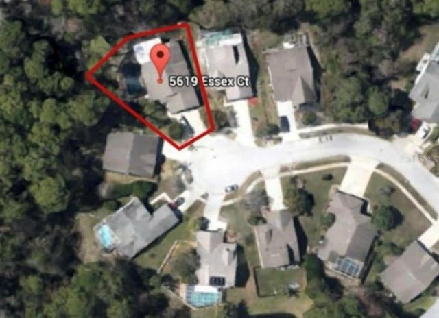 5619 Essex Ct, Palm Harbor, FL 34685 - aerial view of property's location featuring property boundaries highlighted