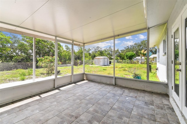 1110 Canal St, Ruskin, FL 33570 - unfurnished sunroom with plenty of natural light and view of scattered trees