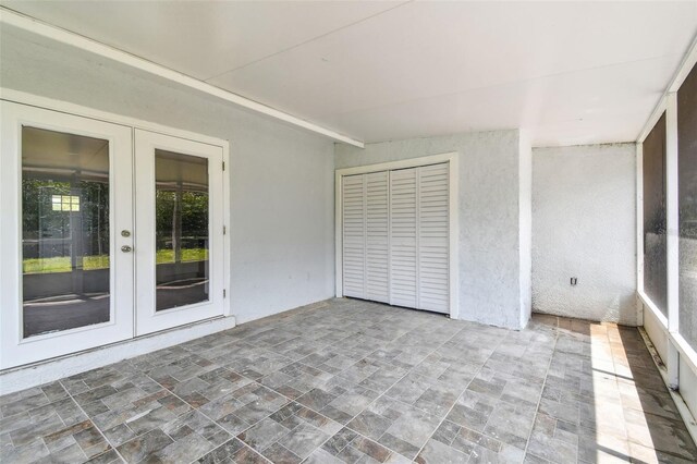1110 Canal St, Ruskin, FL 33570 - unfurnished sunroom with french doors
