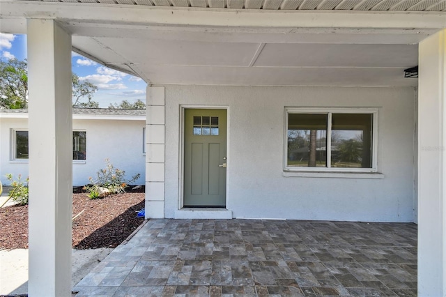 1110 Canal St, Ruskin, FL 33570 - entrance to property featuring stucco siding