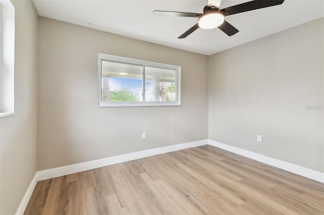1110 Canal St, Ruskin, FL 33570 - empty room featuring wood finished floors, baseboards, and ceiling fan