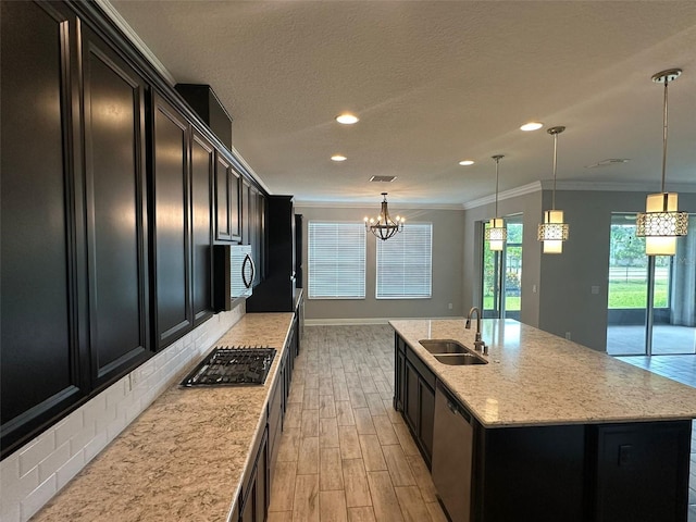 1521 Sourwood Dr, Ocoee, FL 34761 - kitchen featuring a sink, appliances with stainless steel finishes, light wood-style flooring, crown molding, and recessed lighting