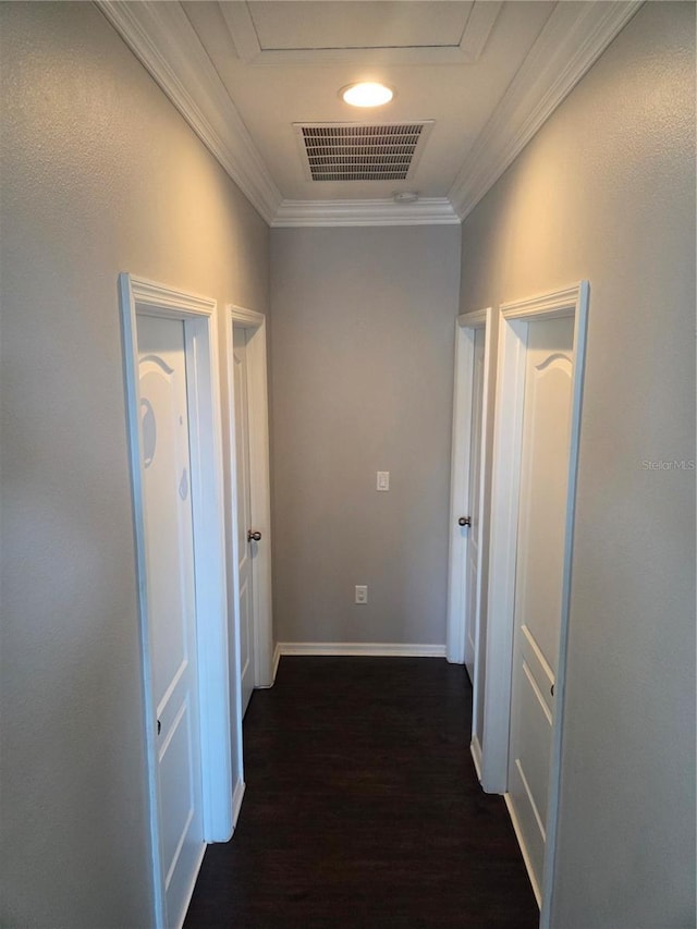 1521 Sourwood Dr, Ocoee, FL 34761 - hallway featuring crown molding, dark wood-style flooring, and baseboards