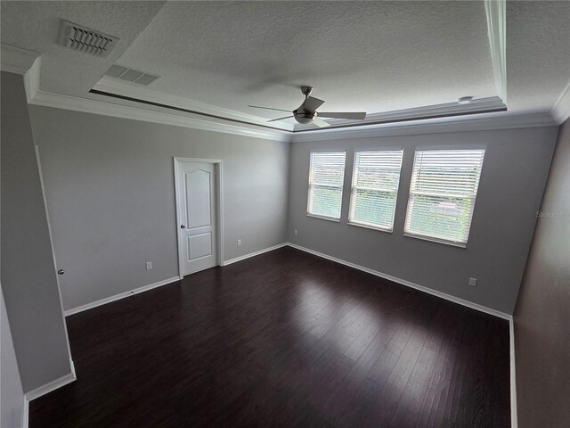 1521 Sourwood Dr, Ocoee, FL 34761 - unfurnished room with ornamental molding, a raised ceiling, a textured ceiling, a ceiling fan, and dark wood-style floors