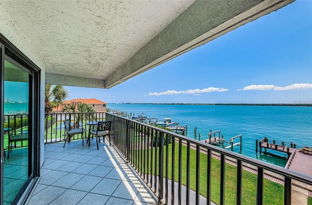 240 Sand Key Estates Dr Unit 222, Clearwater, FL 33767 - balcony featuring a water view