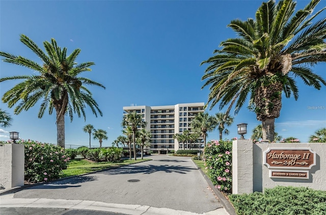 240 Sand Key Estates Dr Unit 222, Clearwater, FL 33767 - view of asphalt street with street lights and curbs