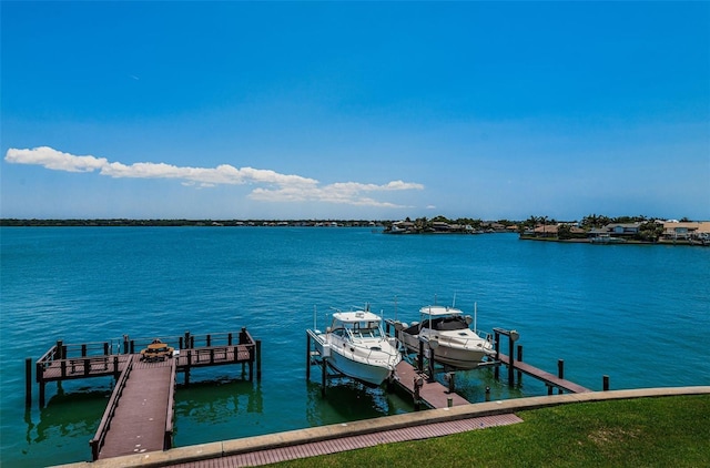 240 Sand Key Estates Dr Unit 222, Clearwater, FL 33767 - dock area with boat lift and a water view