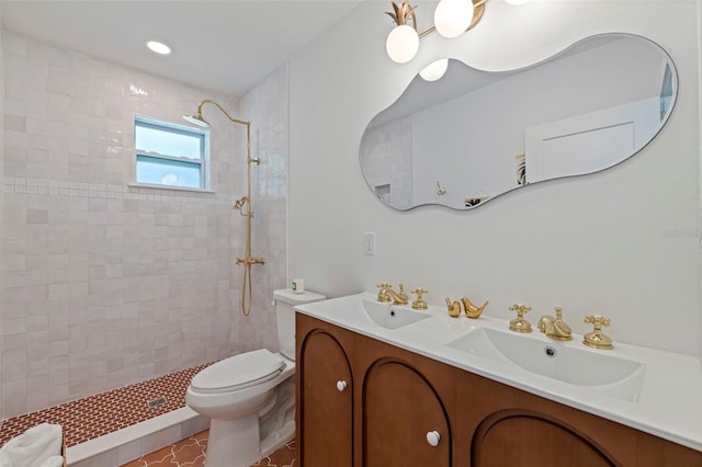 1579 Bayshore Blvd, Dunedin, FL 34698 - bathroom with a tile shower, toilet, and double vanity