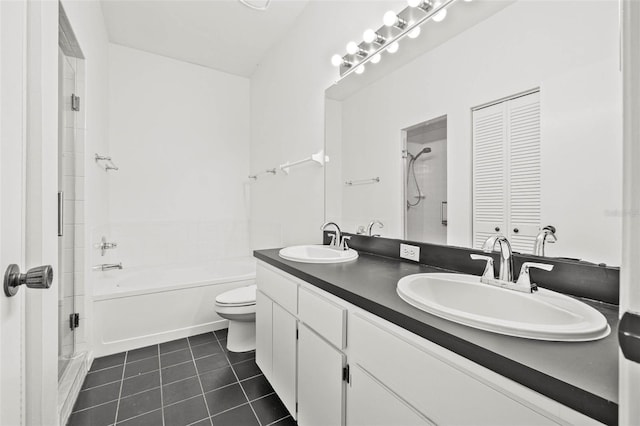 3512 Tealwood Cir, Palm Harbor, FL 34685 - full bath with double vanity, a shower with shower door, tile patterned flooring, a bath, and a closet