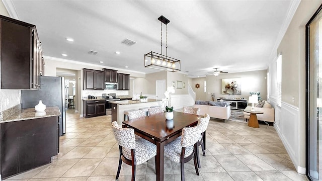 13903 Sage Thrasher Ln, Riverview, FL 33579 - dining space with ceiling fan, light tile patterned floors, ornamental molding, plenty of natural light, and recessed lighting