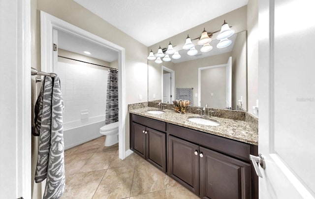13903 Sage Thrasher Ln, Riverview, FL 33579 - bathroom featuring double vanity, shower / bath combo with shower curtain, and tile patterned floors