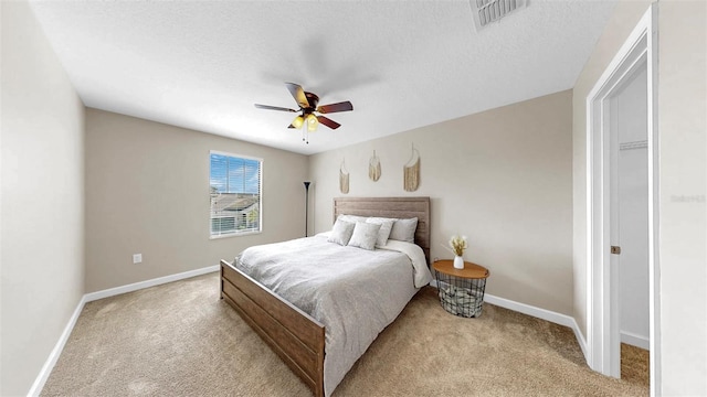 13903 Sage Thrasher Ln, Riverview, FL 33579 - bedroom featuring light colored carpet, ceiling fan, and a textured ceiling