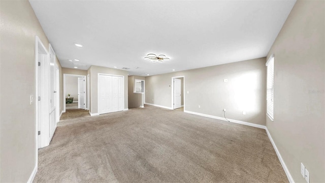 13903 Sage Thrasher Ln, Riverview, FL 33579 - spare room featuring carpet and recessed lighting