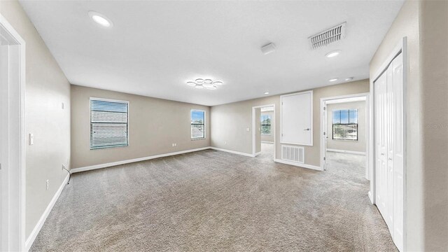 13903 Sage Thrasher Ln, Riverview, FL 33579 - carpeted spare room with plenty of natural light and recessed lighting