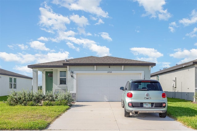 13958 Richland Gulf Cir, Parrish, FL 34219 - single story home with driveway, a garage, a front lawn, and stucco siding