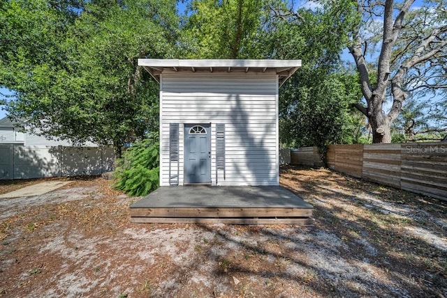12304 Woodleigh Ave, Tampa, FL 33612 - view of outbuilding with a fenced backyard
