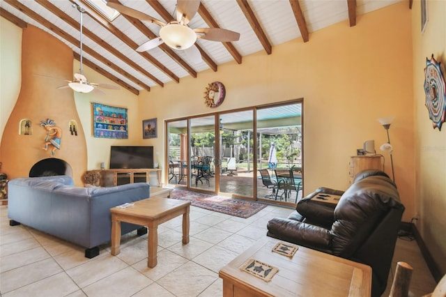 7507 Beasley Rd, Tampa, FL 33615 - living area with a ceiling fan, beam ceiling, high vaulted ceiling, and light tile patterned floors