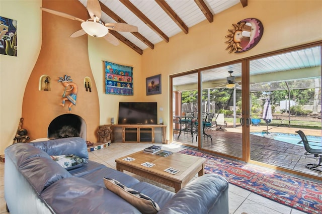 7507 Beasley Rd, Tampa, FL 33615 - living room featuring a ceiling fan, beam ceiling, high vaulted ceiling, and tile patterned floors