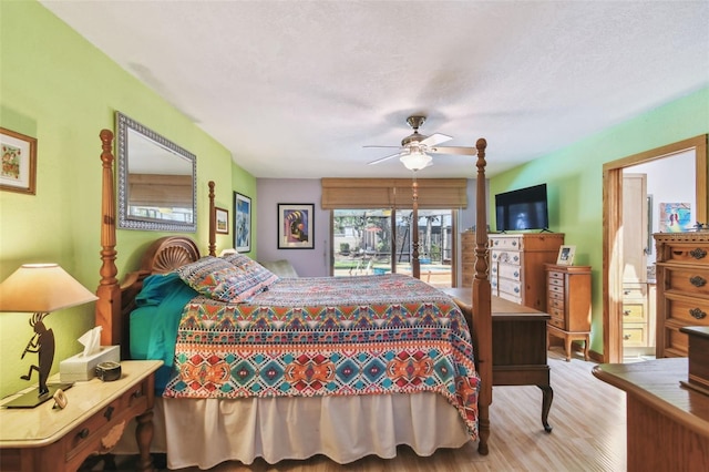 7507 Beasley Rd, Tampa, FL 33615 - bedroom with wood finished floors, ceiling fan, and access to exterior