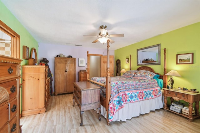 7507 Beasley Rd, Tampa, FL 33615 - bedroom with light wood-style flooring and ceiling fan