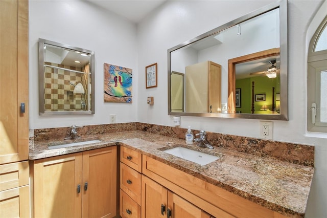 7507 Beasley Rd, Tampa, FL 33615 - bathroom featuring double vanity, tiled shower, and ceiling fan