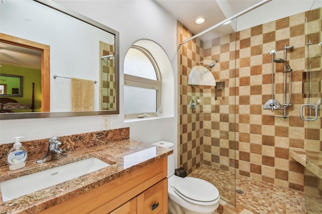 7507 Beasley Rd, Tampa, FL 33615 - full bath with vanity, a shower stall, and toilet