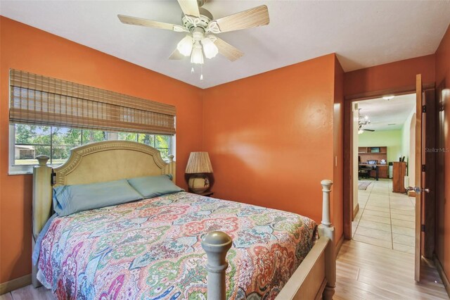 7507 Beasley Rd, Tampa, FL 33615 - bedroom featuring wood finished floors and a ceiling fan