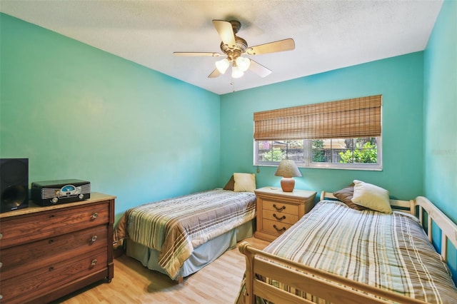 7507 Beasley Rd, Tampa, FL 33615 - bedroom with wood finished floors and ceiling fan