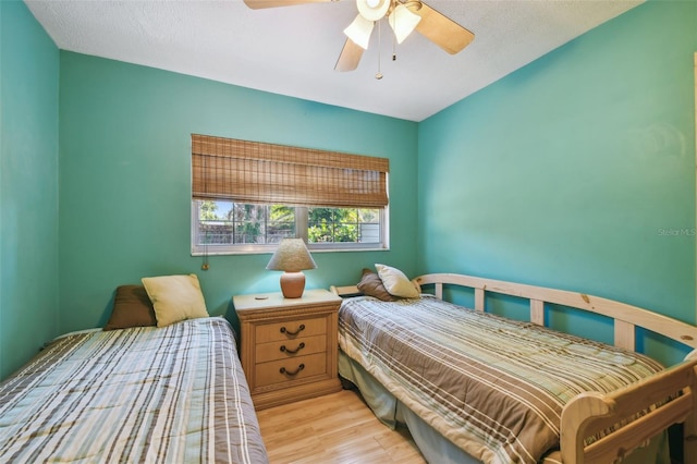7507 Beasley Rd, Tampa, FL 33615 - bedroom featuring wood finished floors and a ceiling fan