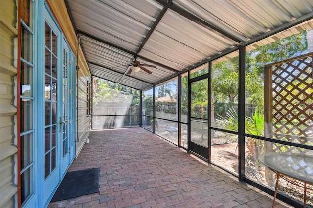 7507 Beasley Rd, Tampa, FL 33615 - unfurnished sunroom featuring french doors and a ceiling fan