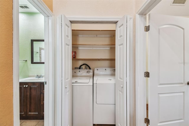 7507 Beasley Rd, Tampa, FL 33615 - washroom featuring independent washer and dryer