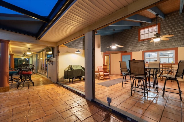 7507 Beasley Rd, Tampa, FL 33615 - view of patio / terrace with ceiling fan, outdoor dining area, and grilling area
