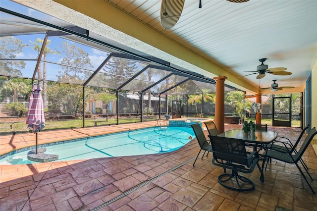 7507 Beasley Rd, Tampa, FL 33615 - view of pool with ceiling fan, a pool with connected hot tub, a patio, and a lanai
