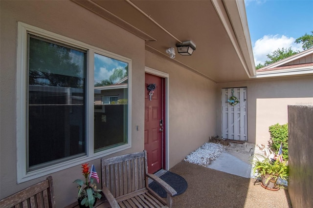 2444 Laurelwood Dr Unit A, Clearwater, FL 33763 - doorway to property with stucco siding