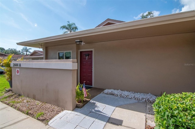 2444 Laurelwood Dr Unit A, Clearwater, FL 33763 - entrance to property featuring stucco siding