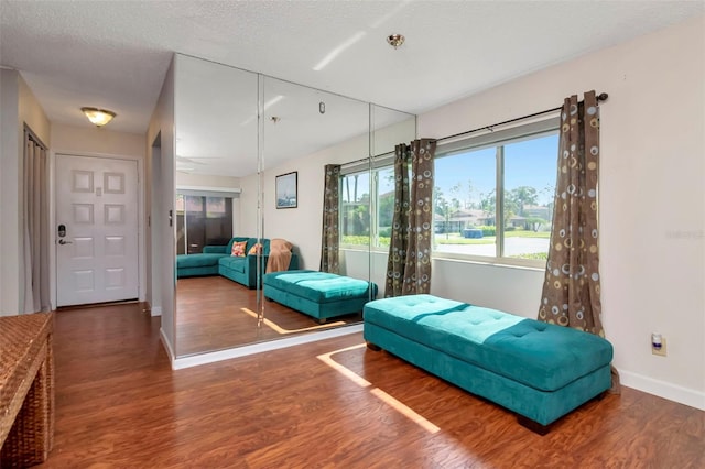 2444 Laurelwood Dr Unit A, Clearwater, FL 33763 - sitting room featuring wood finished floors and baseboards
