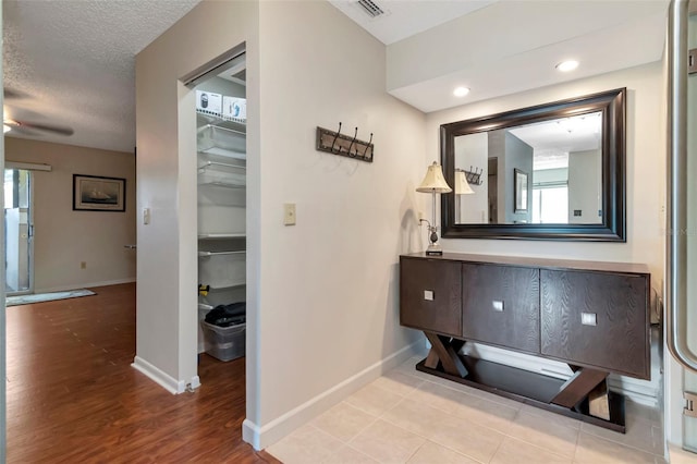 2444 Laurelwood Dr Unit A, Clearwater, FL 33763 - corridor with baseboards, wood finished floors, and recessed lighting