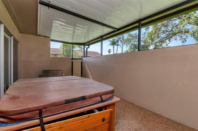 2444 Laurelwood Dr Unit A, Clearwater, FL 33763 - view of patio featuring a hot tub