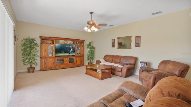 3862 Tristram Loop, Land O Lakes, FL 34638 - living room featuring ceiling fan, light colored carpet, and baseboards