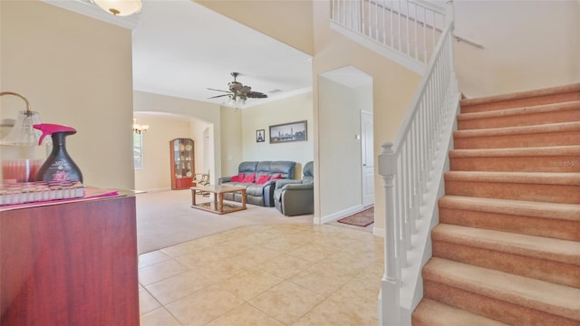 3862 Tristram Loop, Land O Lakes, FL 34638 - stairs with arched walkways, carpet flooring, a ceiling fan, and baseboards